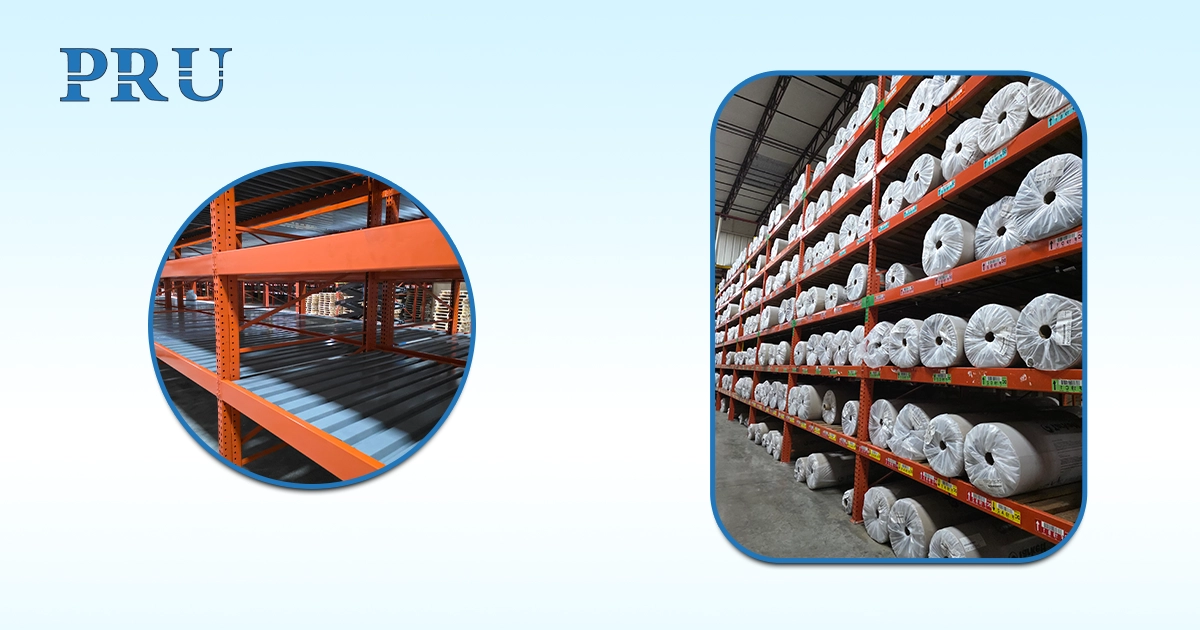 Industrial warehouse carpet storage racks, including close-up of empty orange pallet flow racking and shelves stocked with white rolled goods.